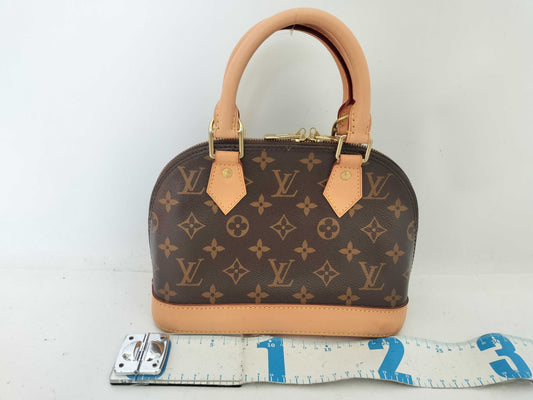 LOUIS VUITTON Monogram Louis Vuitton Alma BB Handbag