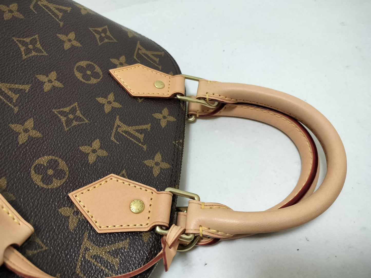 LOUIS VUITTON Monogram Louis Vuitton Alma BB Handbag