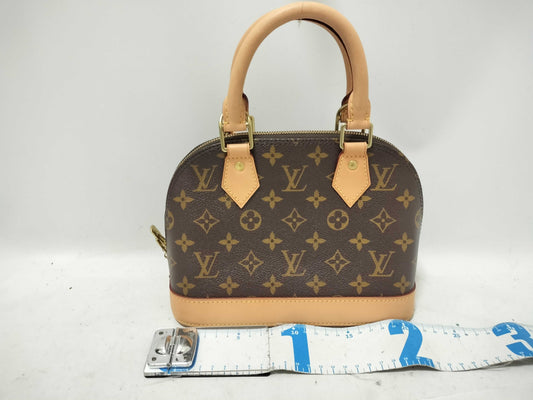 LOUIS VUITTON Monogram Louis Vuitton Alma BB Handbag