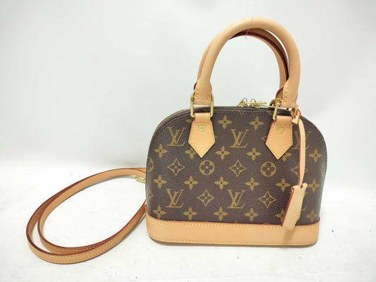 LOUIS VUITTON Monogram Louis Vuitton Alma BB Handbag