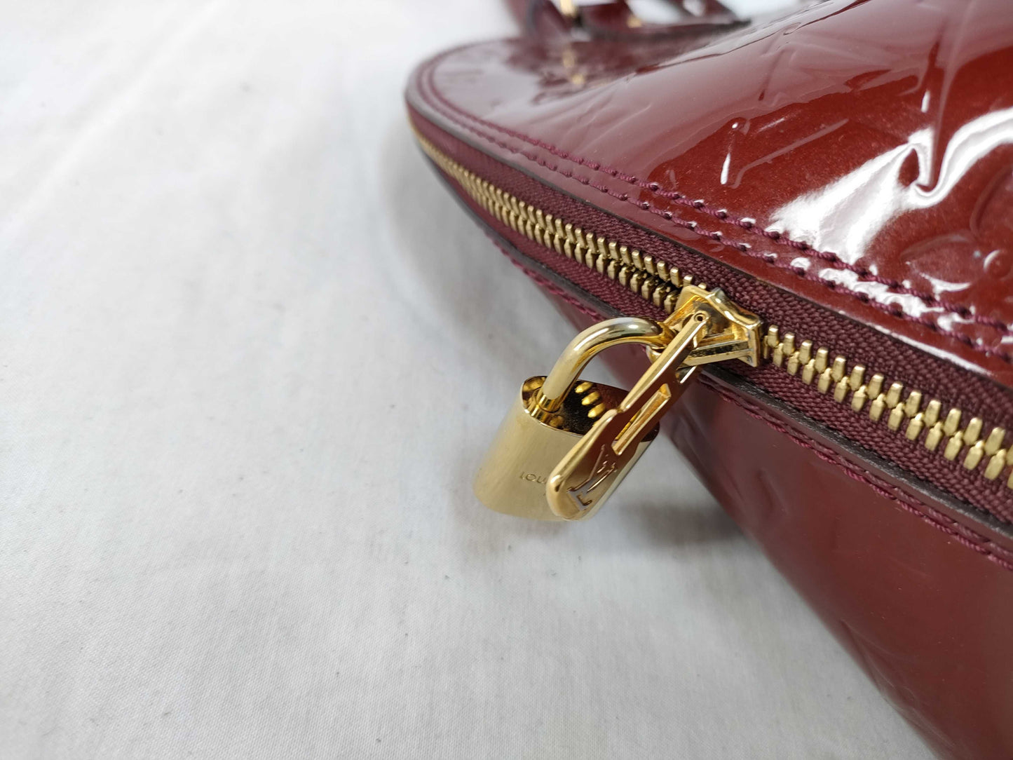 LOUIS VUITTON Louis Vuitton Enamel Alma BB Handbag