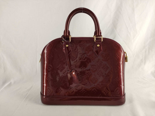 LOUIS VUITTON Louis Vuitton Enamel Alma BB Handbag