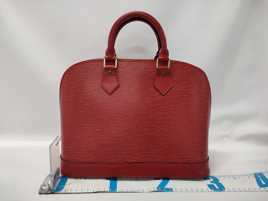 LOUIS VUITTON Epi Alma Handbag