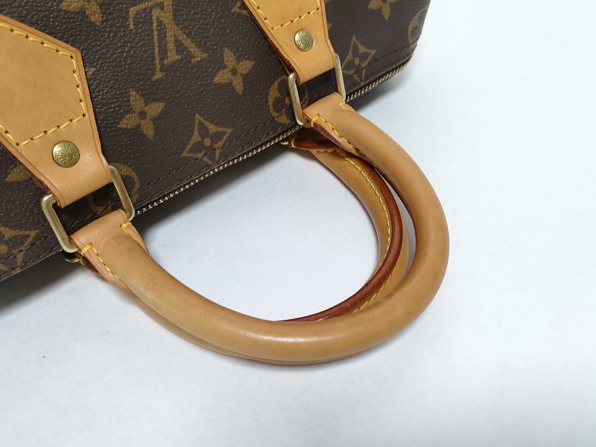 LOUIS VUITTON Monogram Vuitton Speedy 25 Handbag