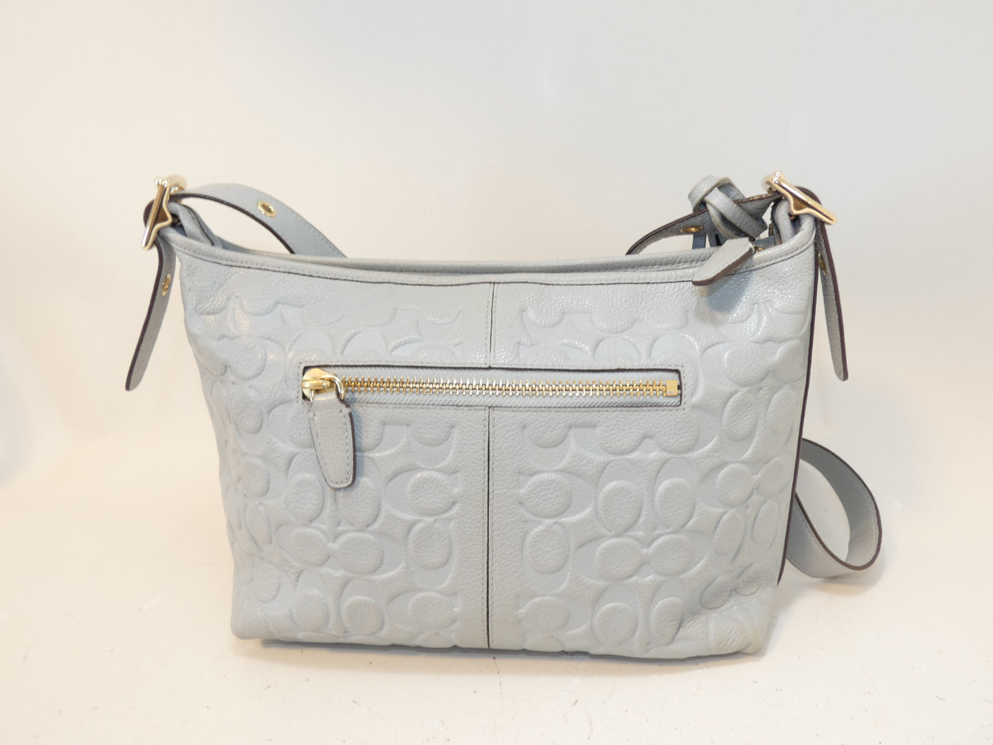 COACH Signature Embossed Leather Tassel Shoulder Bag