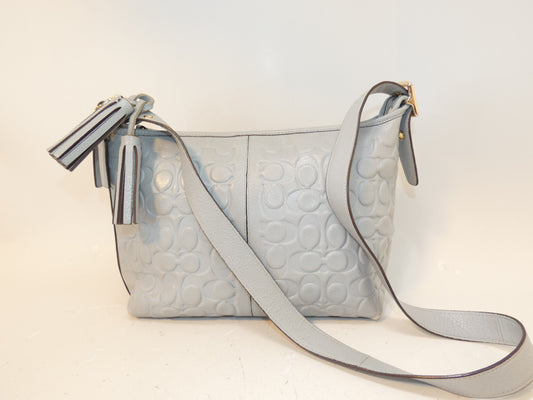 COACH Signature Embossed Leather Tassel Shoulder Bag