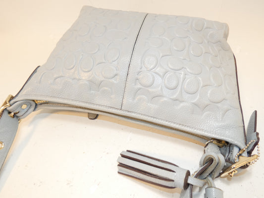 COACH Signature Embossed Leather Tassel Shoulder Bag
