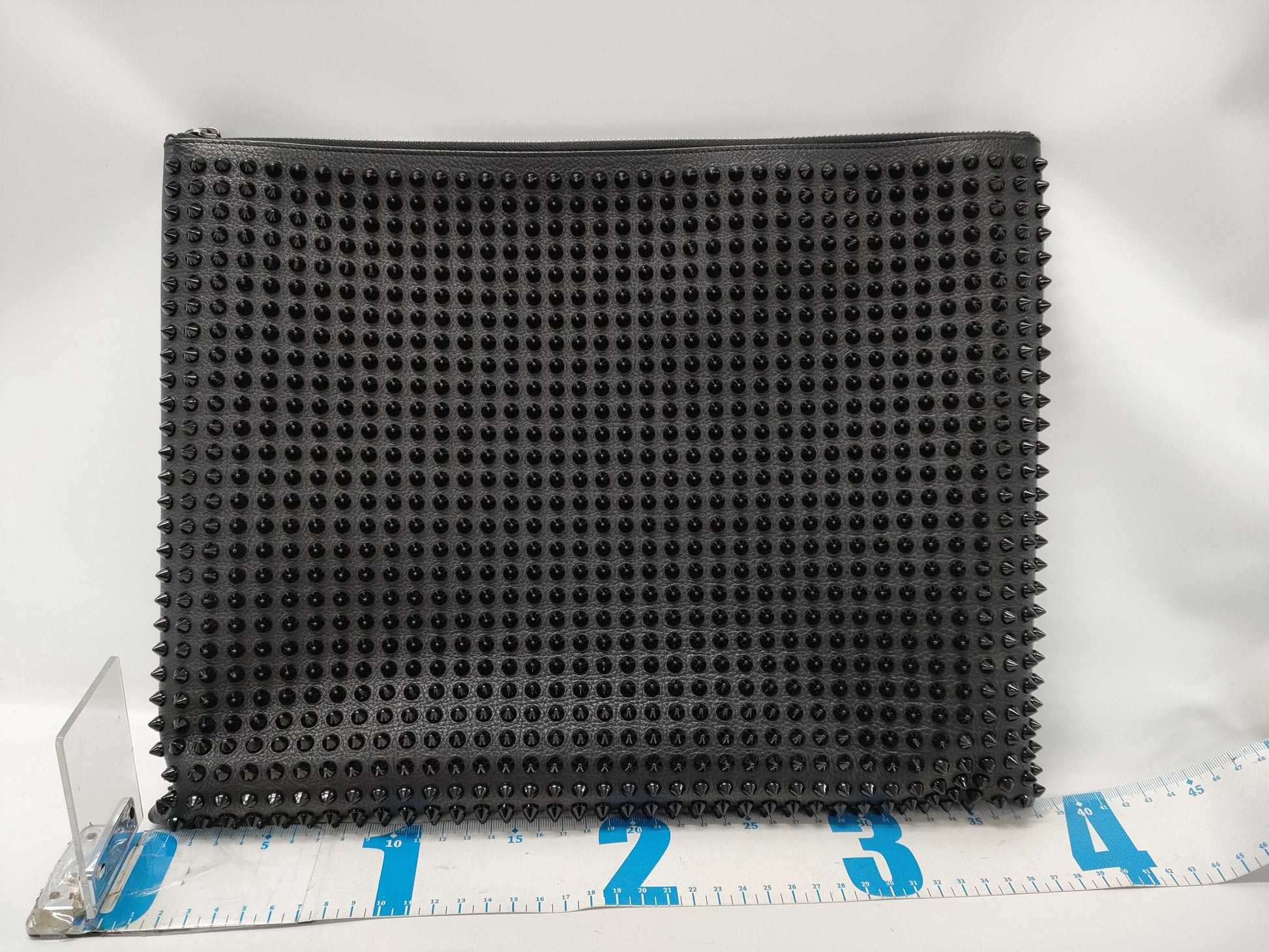 Christian Louboutin Studded Clutch Bag. Accessories: Box, Dust Bag.