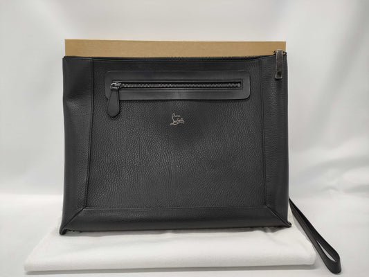 Christian Louboutin Studded Clutch Bag. Accessories: Box, Dust Bag.