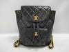 CHANEL Double Turn Lock Backpack
