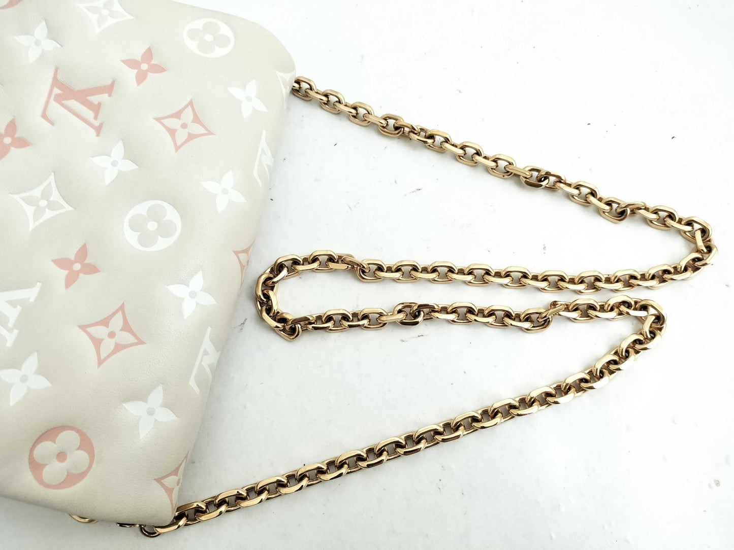LOUIS VUITTON Coussin Monogram Embossed Pochette in Beige and Multicolore, M82289 Shoulder Bag