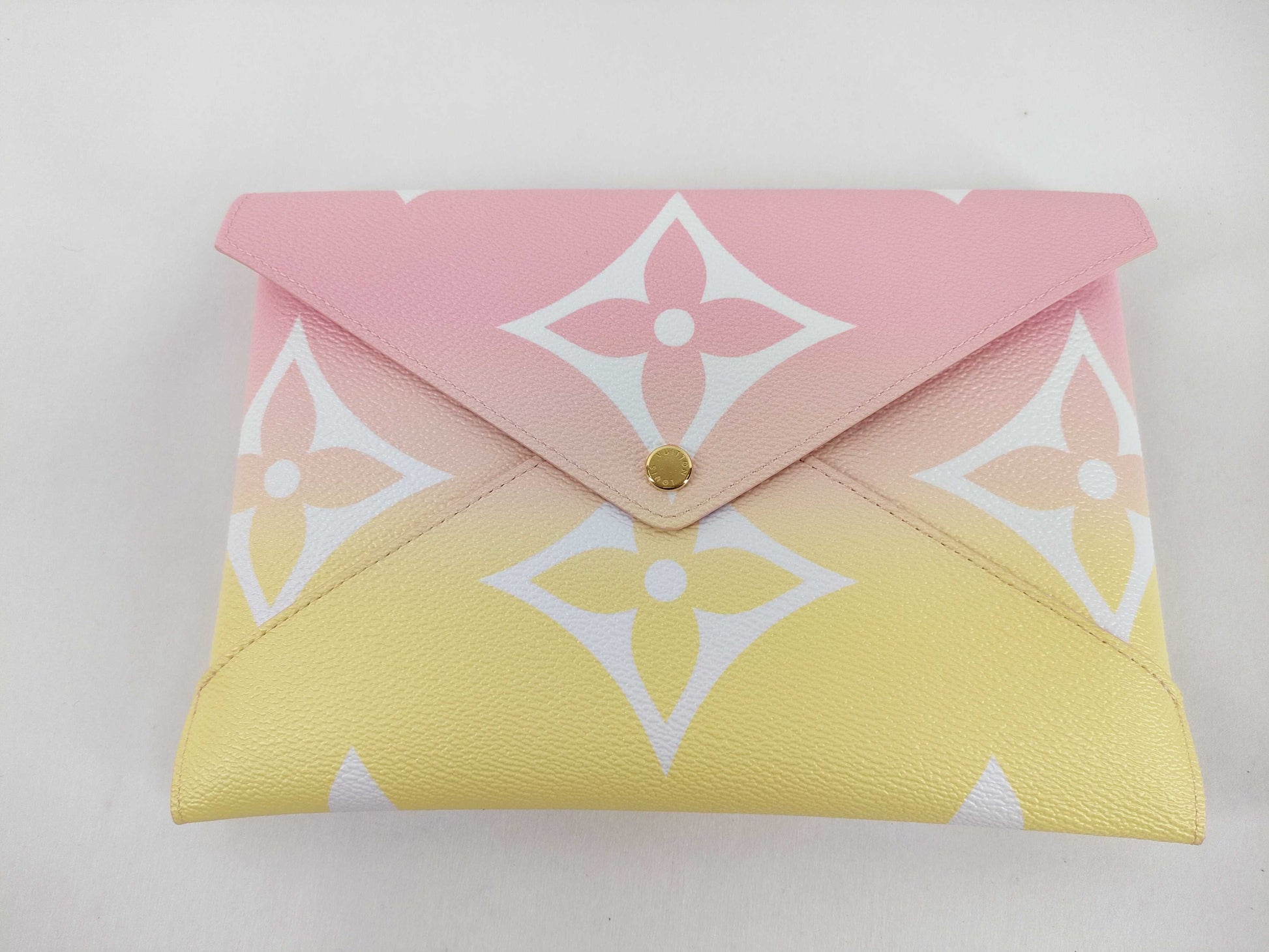 LOUIS VUITTON Monogram Pochette Kirigami Pouch Clutch Bag Brand New, Unused Clutch Bag