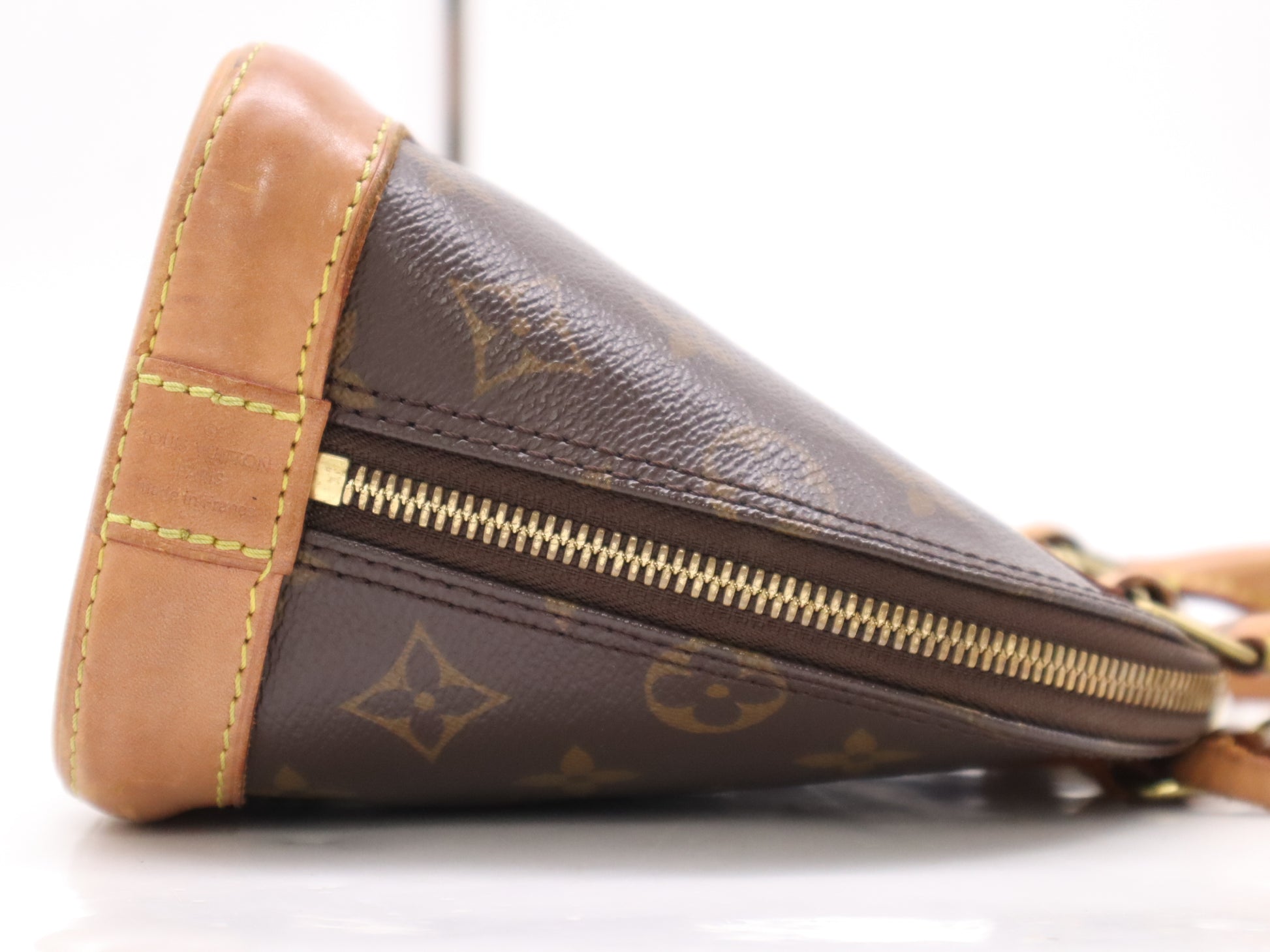 LOUIS VUITTON M53152 Monogram Alma BB Handbag with dust bag, box, padlock, two keys, and clochette