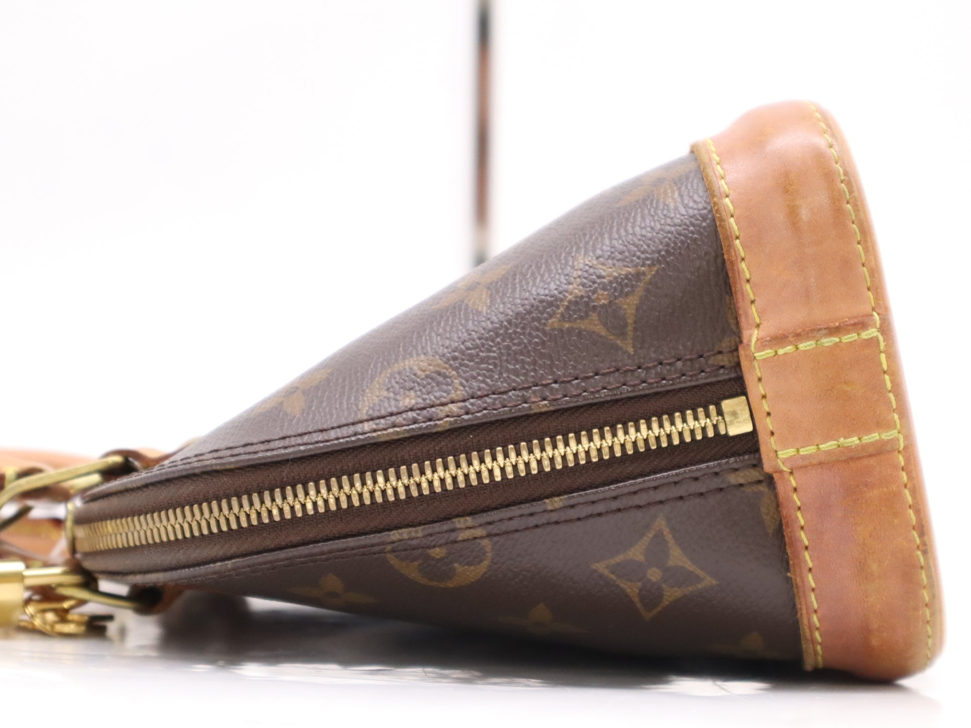LOUIS VUITTON M53152 Monogram Alma BB Handbag with dust bag, box, padlock, two keys, and clochette