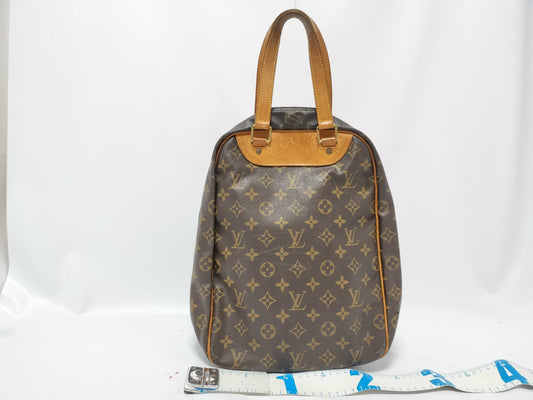 LOUIS VUITTON Monogram Excursion Handbag