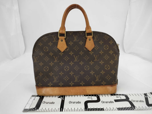 LOUIS VUITTON Monogram Alma Handbag