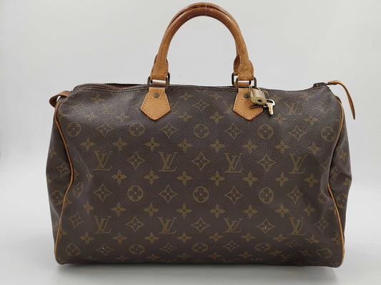 LOUIS VUITTON Louis Vuitton Monogram Speedy 30 Handbag
