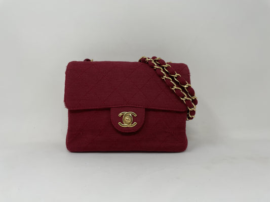 CHANEL CHANEL Mini Matelasse Shoulder Bag with Turn Lock, Gold Hardware, and Coco Mark