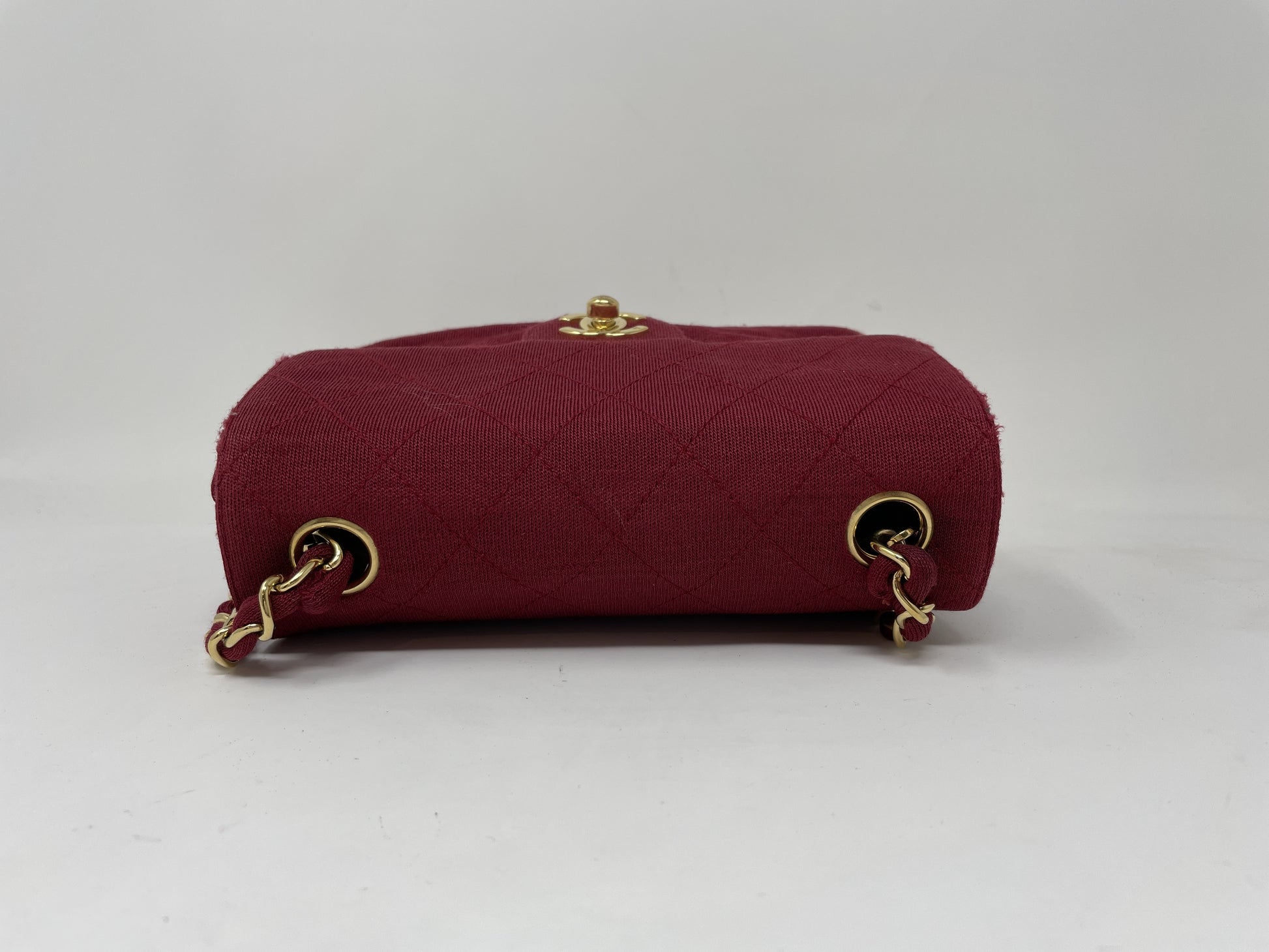 CHANEL CHANEL Mini Matelasse Shoulder Bag with Turn Lock, Gold Hardware, and Coco Mark