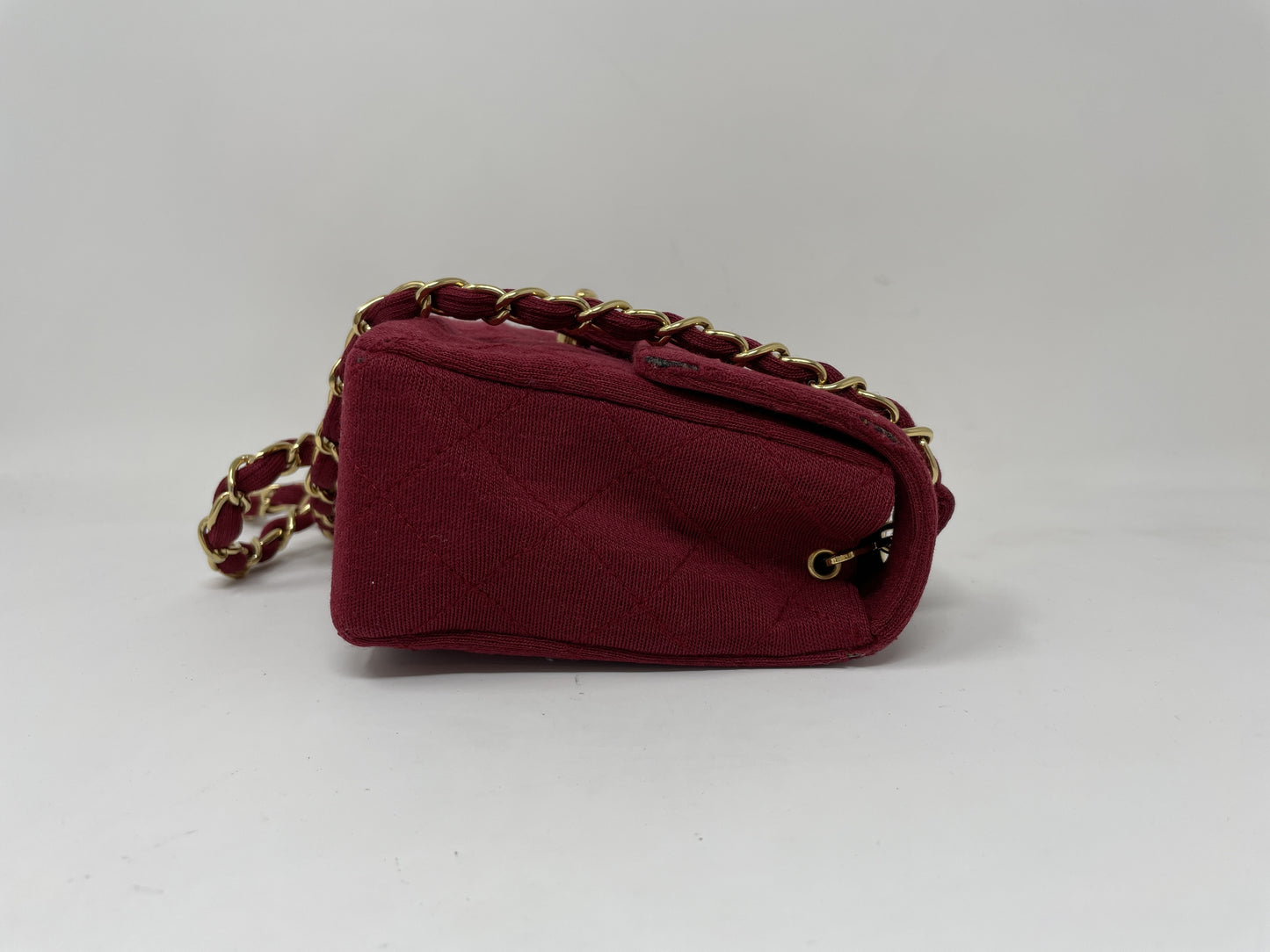 CHANEL CHANEL Mini Matelasse Shoulder Bag with Turn Lock, Gold Hardware, and Coco Mark