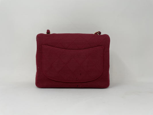 CHANEL CHANEL Mini Matelasse Shoulder Bag with Turn Lock, Gold Hardware, and Coco Mark