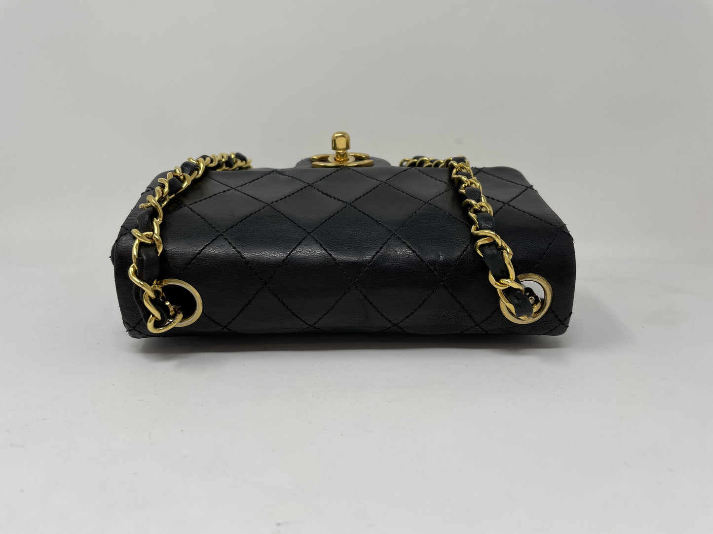 CHANEL CHANEL Mini Matelasse Shoulder Bag with Gold Hardware, Coco Mark, and Turn Lock