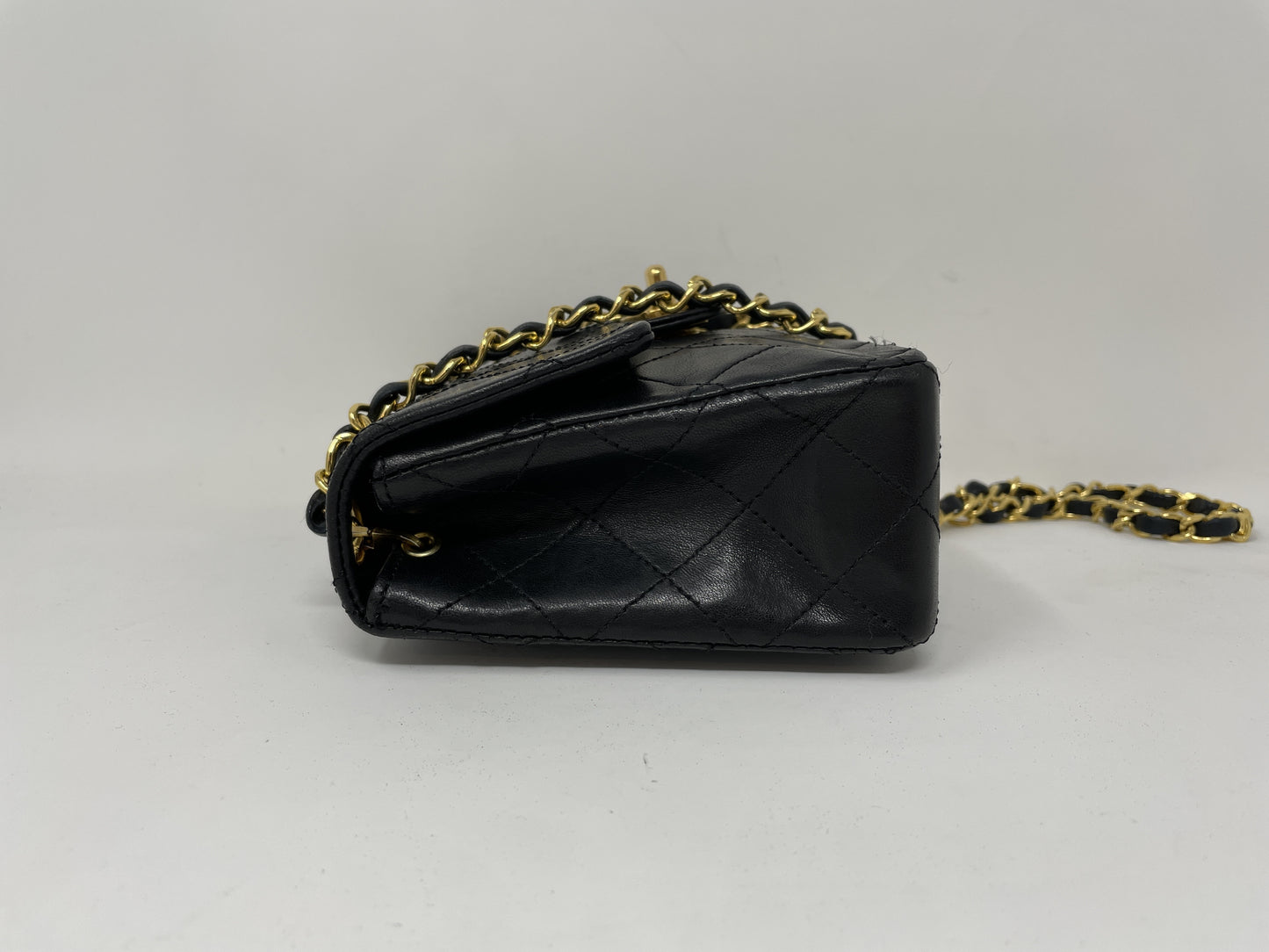 CHANEL CHANEL Mini Matelasse Shoulder Bag with Gold Hardware, Coco Mark, and Turn Lock