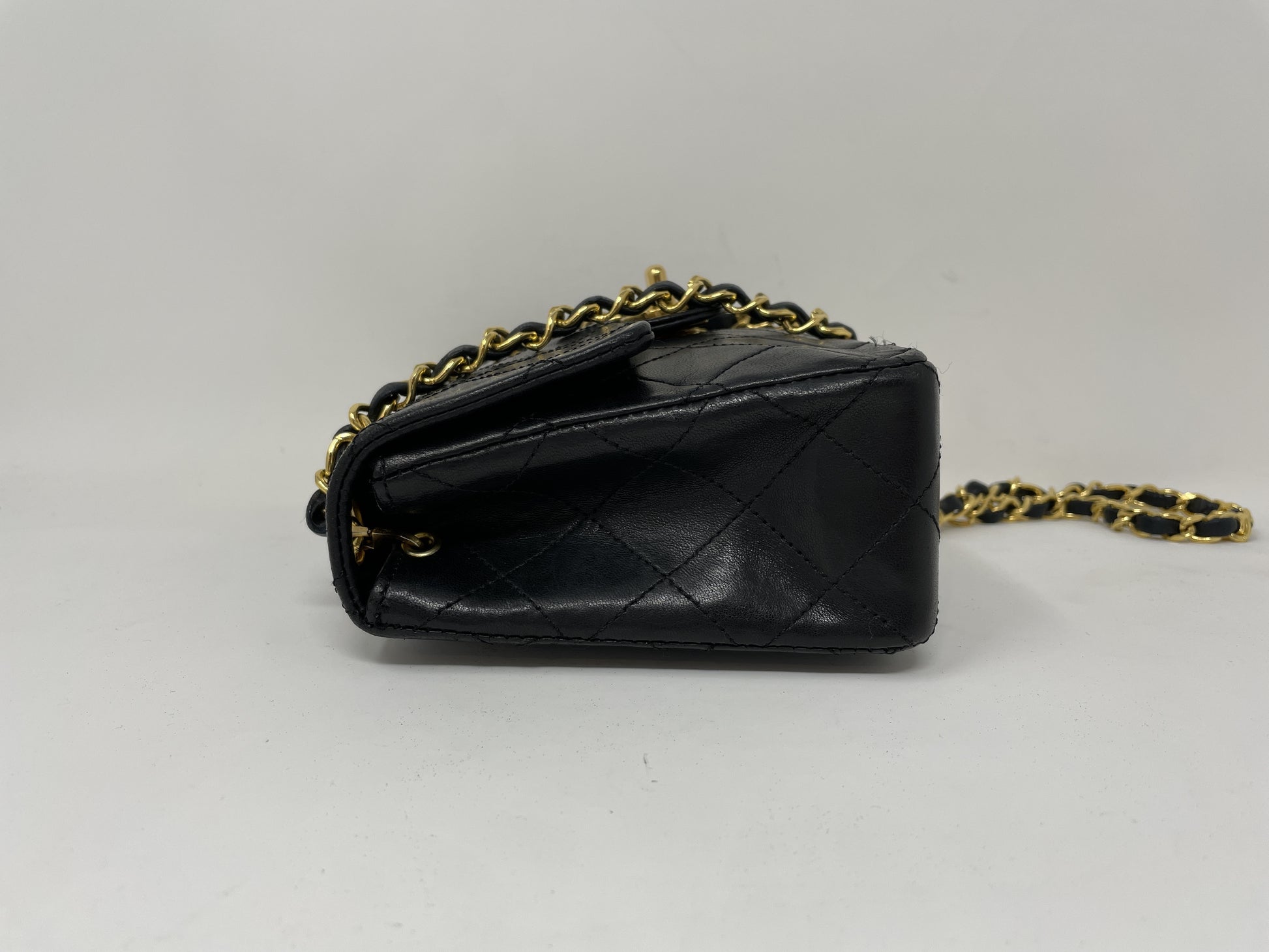 CHANEL CHANEL Mini Matelasse Shoulder Bag with Gold Hardware, Coco Mark, and Turn Lock
