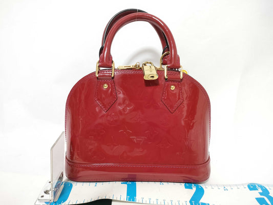 LOUIS VUITTON Vernis Alma BB Handbag