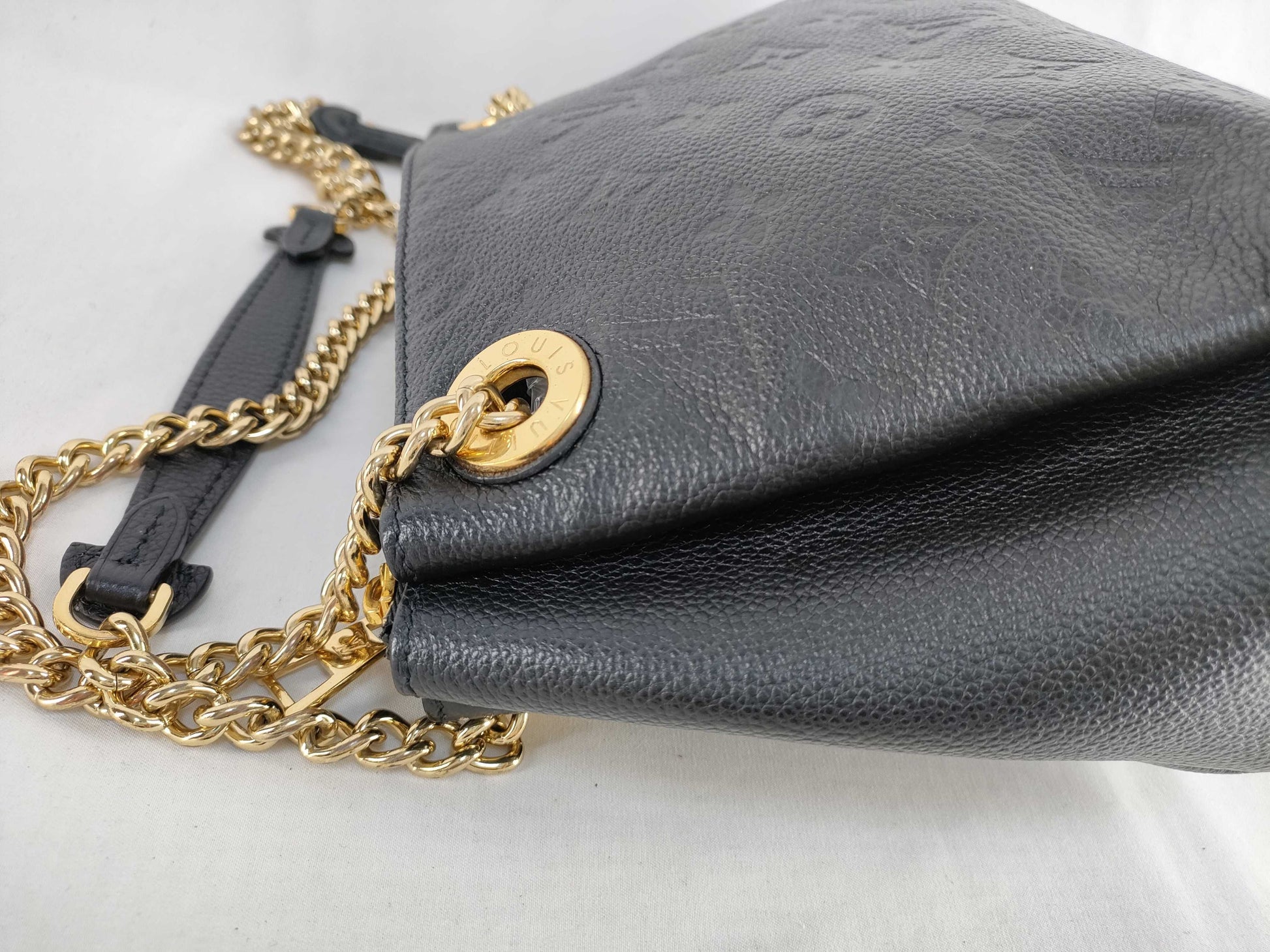 LOUIS VUITTON Monogram Empreinte Louis Vuitton SURENE Shoulder Bag