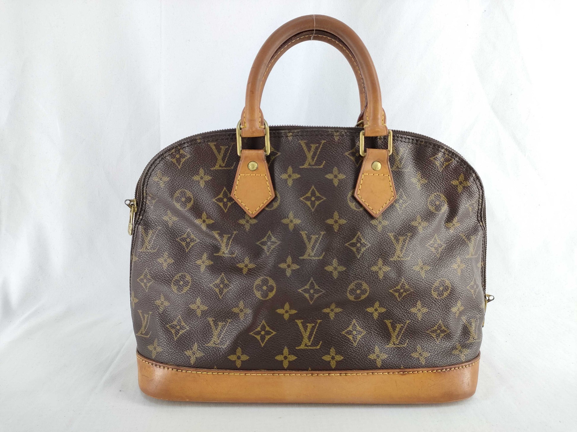 LOUIS VUITTON Monogram Louis Vuitton Alma Handbag
