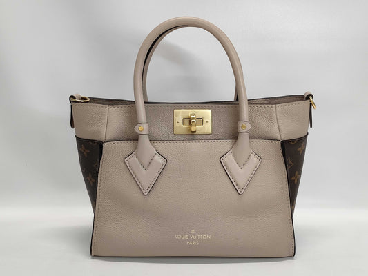 LOUIS VUITTON Louis Vuitton On My Side Handbag Handbag