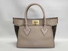 LOUIS VUITTON Louis Vuitton On My Side Handbag Handbag