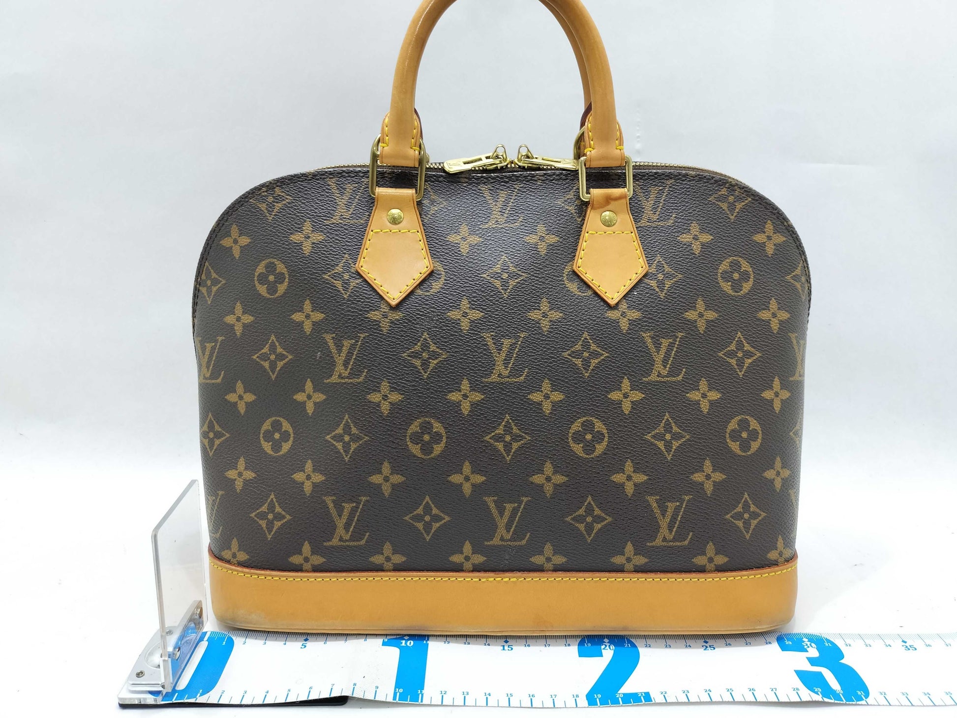 LOUIS VUITTON Monogram Vuitton Monogram Alma Handbag