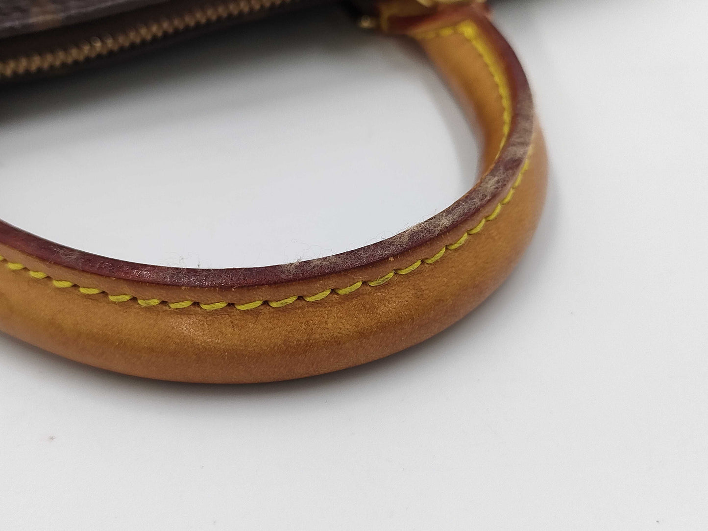 LOUIS VUITTON Monogram ALMA Handbag