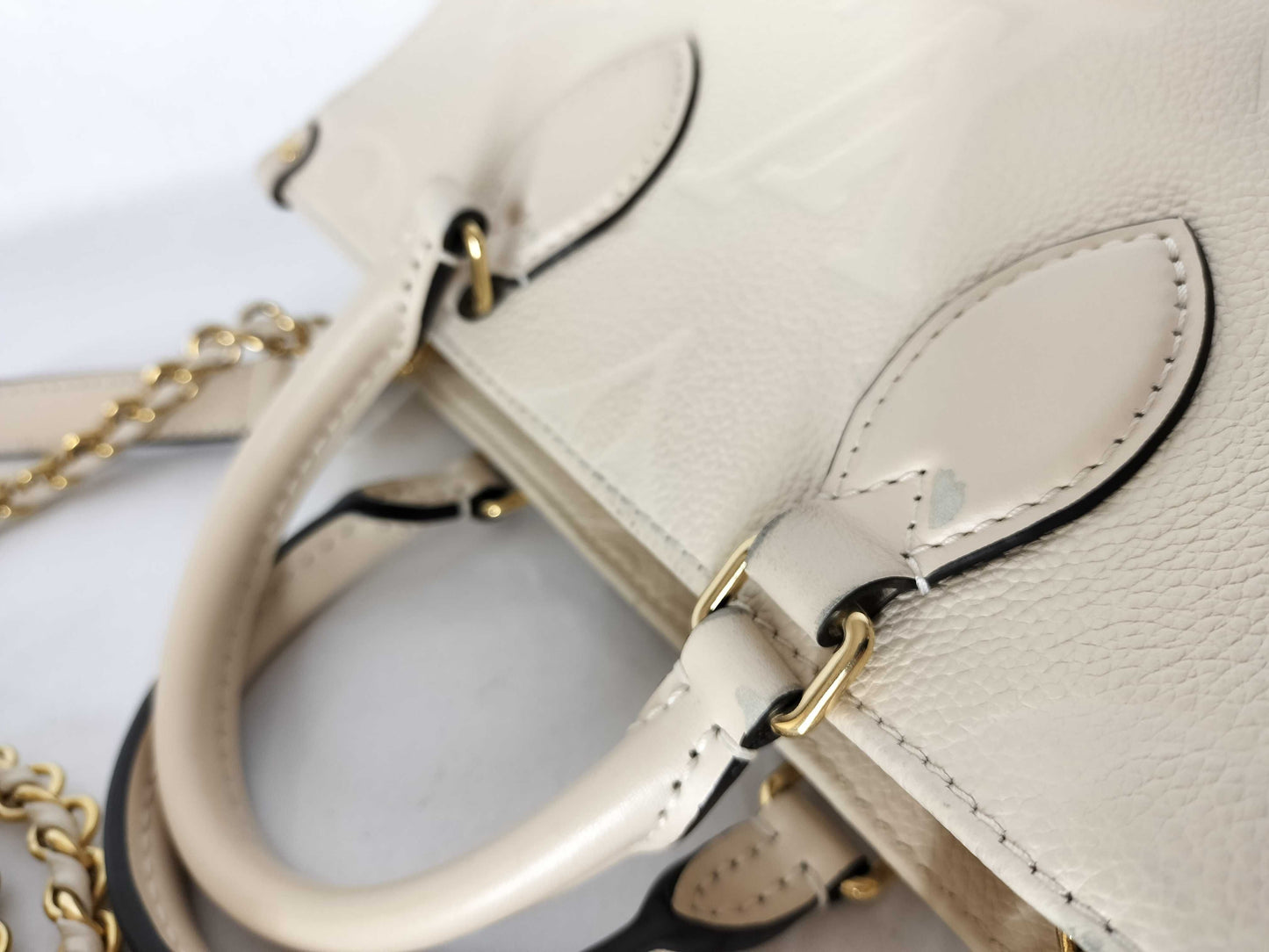 LOUIS VUITTON Monogram Empreinte On-the-Go EW IC Shoulder Bag