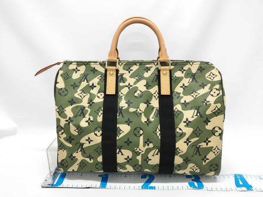 LOUIS VUITTON M95773 Monogrammed Speedy 35 Handbag