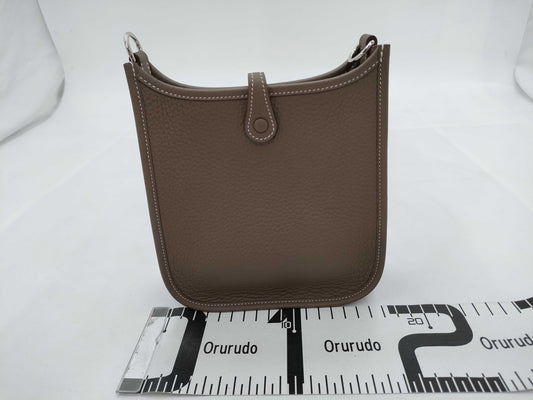 HERMES Evelyn TPM Taurillon Clemence Etoupe/Blue Indigo Shoulder Bag with Silver Hardware and Double Stamp