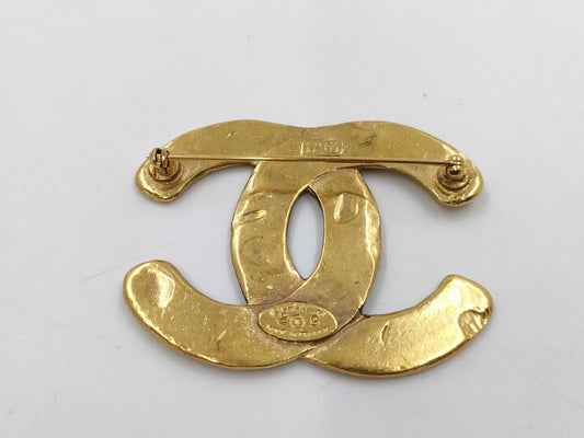 CHANEL brooches