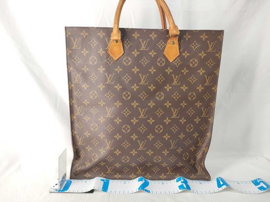 LOUIS VUITTON Monogram Louis Vuitton Sack Pla Monogram Handbag