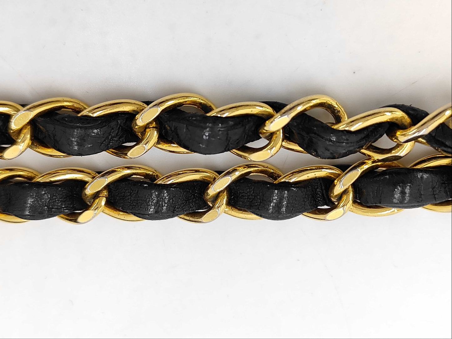 CHANEL Chain Shoulder Bag in Black and Gold