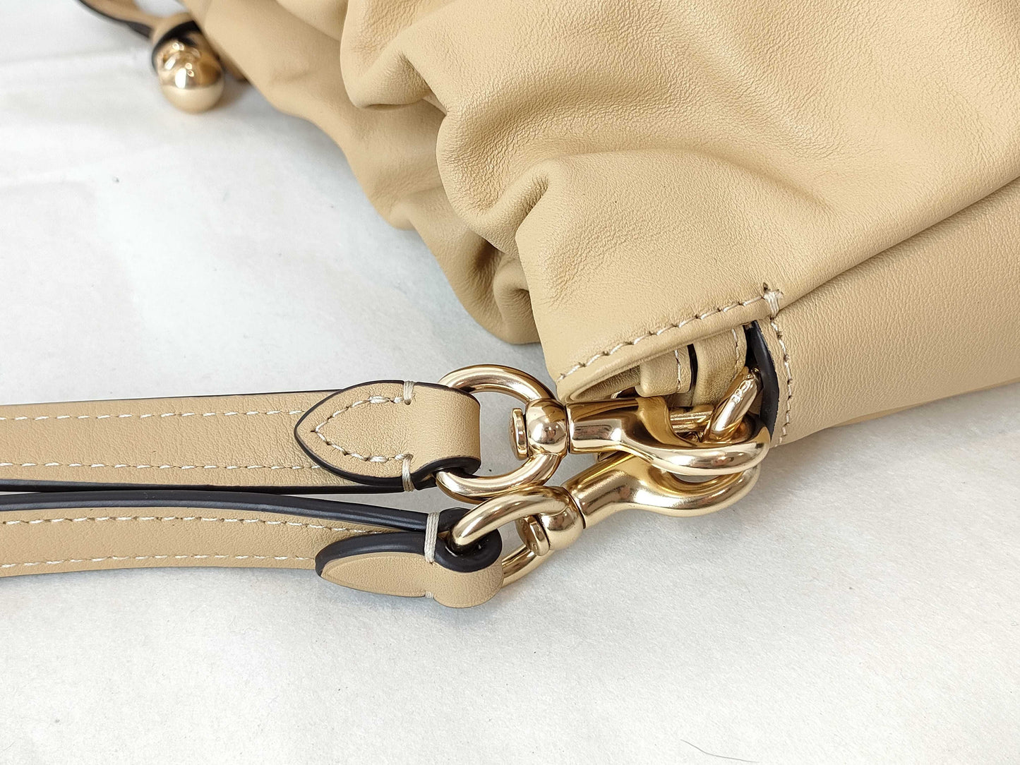 COACH Faye Drawstring Shoulder Bag in Beige Leather