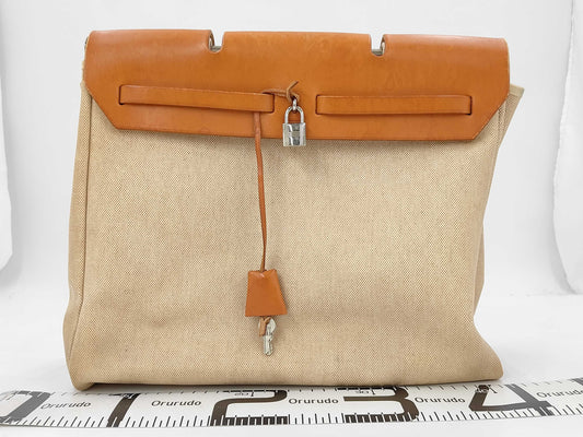 HERMES Airbag MM Handbag, □B Stamp, Toile H Leather, Natural Brown, Includes Cloche, Padlock, Two Keys, Box, Dust Bag, and Spare Bag