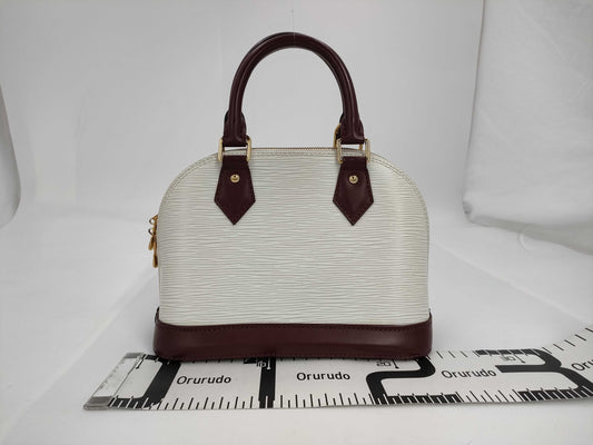 LOUIS VUITTON Epi Alma BB Handbag
