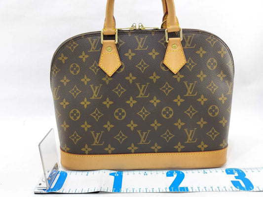 LOUIS VUITTON Monogram Vuitton Monogram Alma Handbag