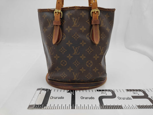 LOUIS VUITTON Louis Vuitton Monogram Bucket PM Handbag
