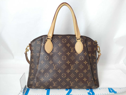 LOUIS VUITTON Monogram LOUIS VUITTON Rivoli MM Monogram Handbag
