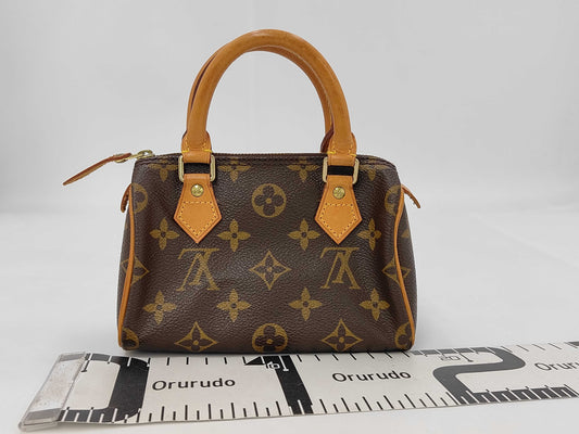 LOUIS VUITTON Monogram Mini Speedy Handbag