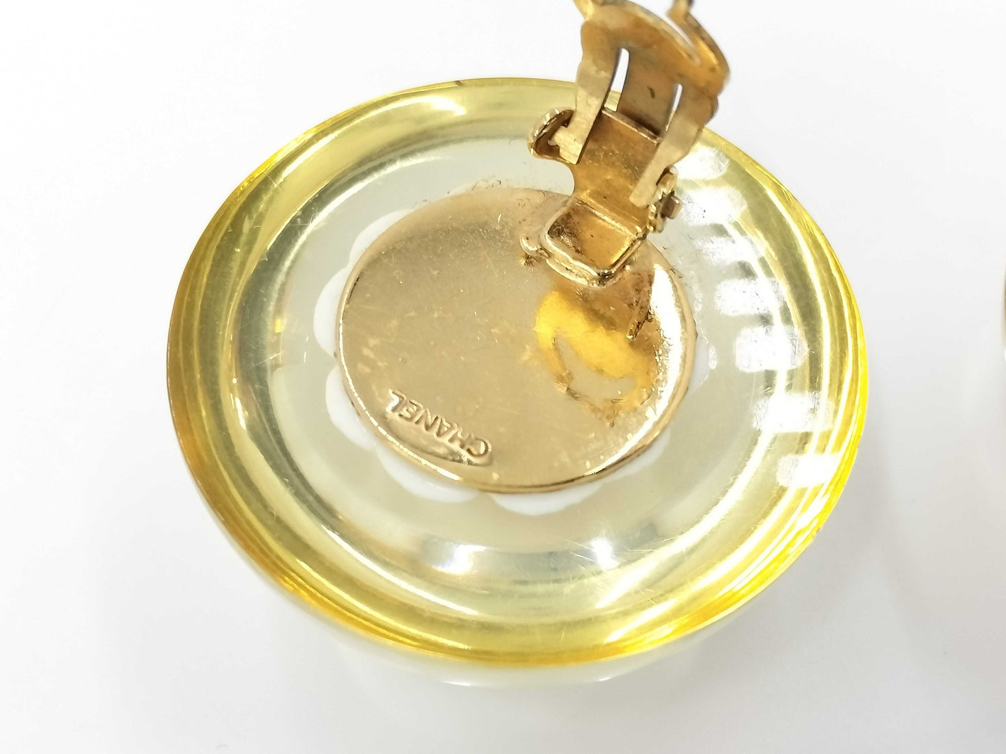 CHANEL engraved camellia and clover large earrings