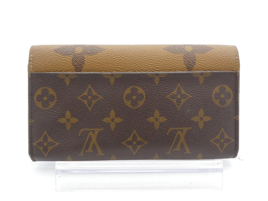 LOUIS VUITTON Monogram Giant Reverse Portefeuille Sarah Wallet with IC Reaction